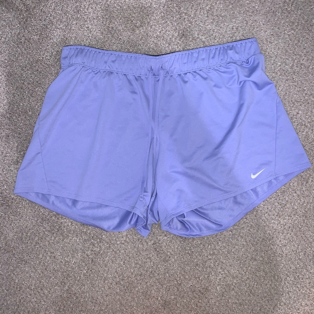 purple Nike shorts